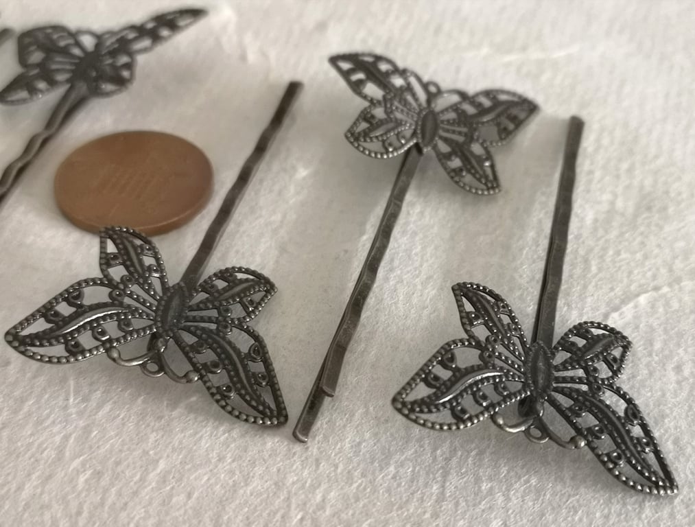 Antique gold hair grips with butterfly decoration 