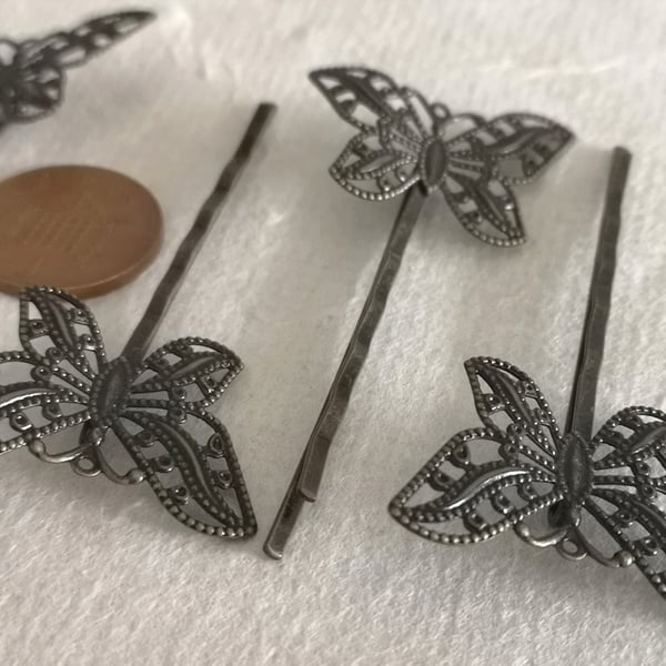 Antique gold hair grips with butterfly decoration 