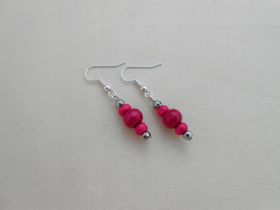 Bright pink & hematite dangle earrings for women.