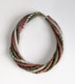 The Wrapped Twist: felted cord necklace in shades of green, stone and mulberry - Image 3