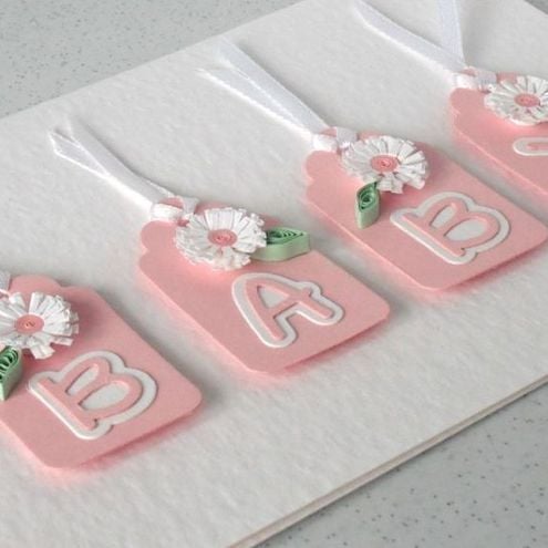 New baby girl birth congratulations card with quilled stork