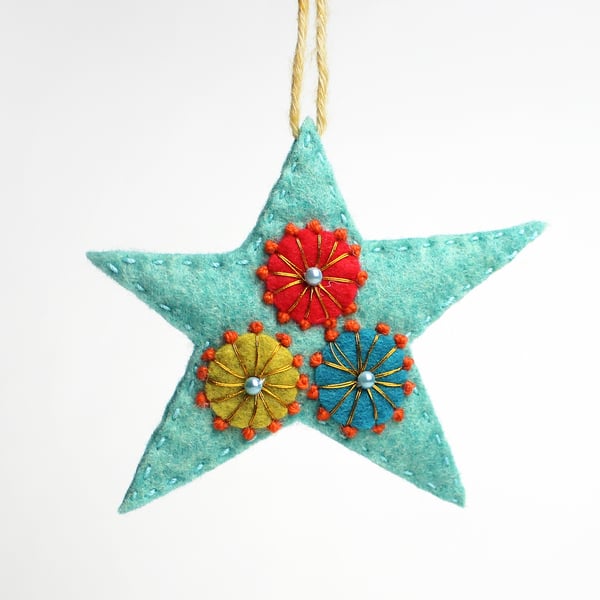 Blue star hanging ornament with folk embroidery