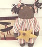 Primitive black American doll with star