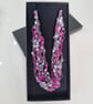 Crocheted necklace in shales of pink with a touch of silver, lightweight - Image 1