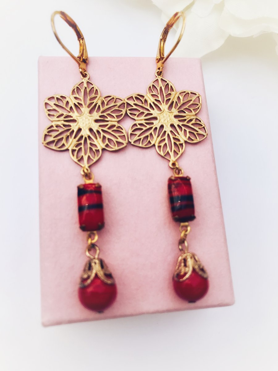 Vintage red and black glass and brass filigree earrings. 