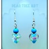 Blue Glass Heart drop earrings on Silver plated hooks.