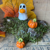 Really tiny ceramic ghost with pumpkins
