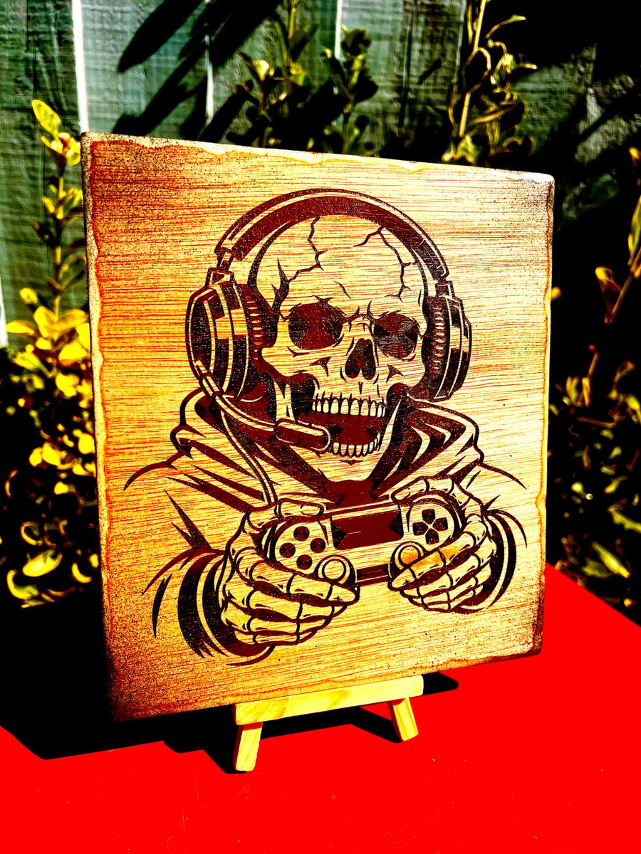 Skull boy gamer. Wooden plaque 