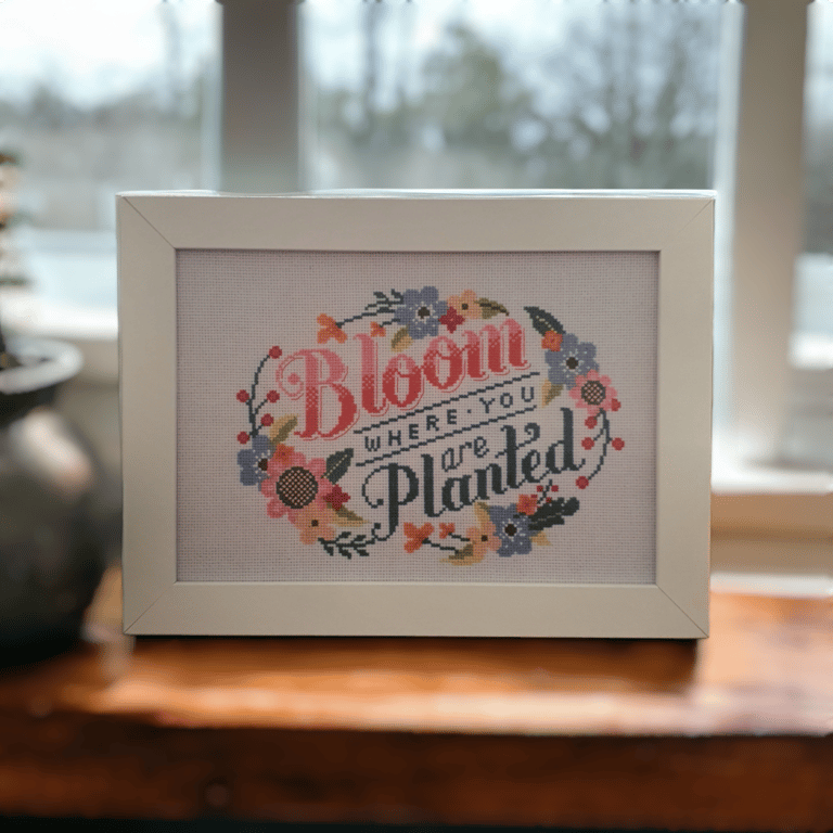 Hand stitched affirmation quote complete with white frame 