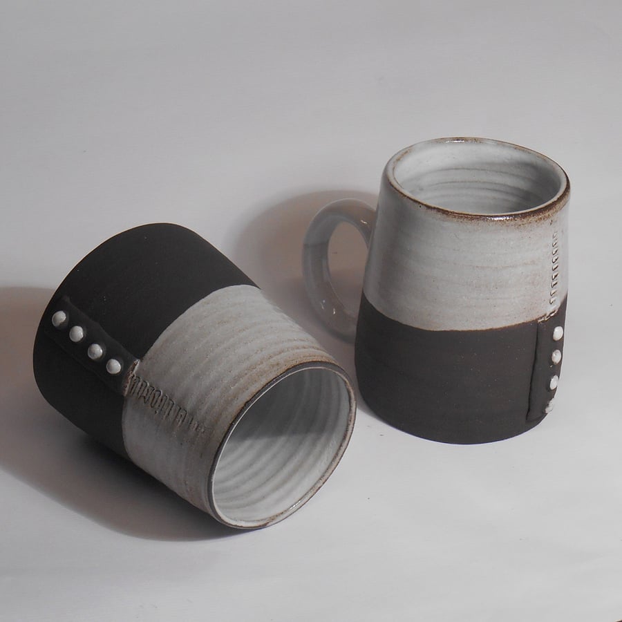 Mugs Black clay 4 dot stoneware Pair.
