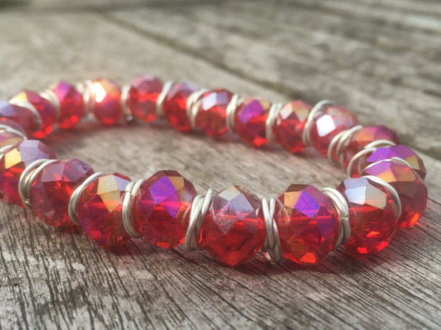 Red cut glass bracelet with silver jump rings