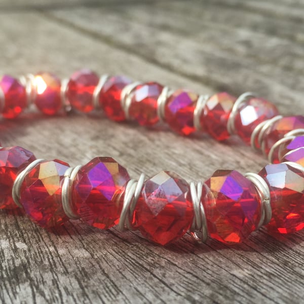 Red cut glass bracelet with silver jump rings