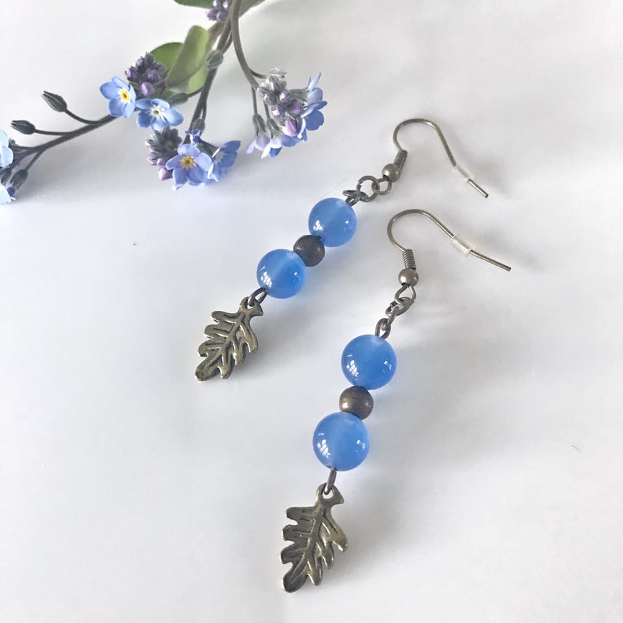 FREE P&P Cornflower blue glass dangle earrings with brass leaves