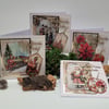 Boxed set of 4 Christmas Cards - Traditional Santa, Carolling, Train, Poinsettia