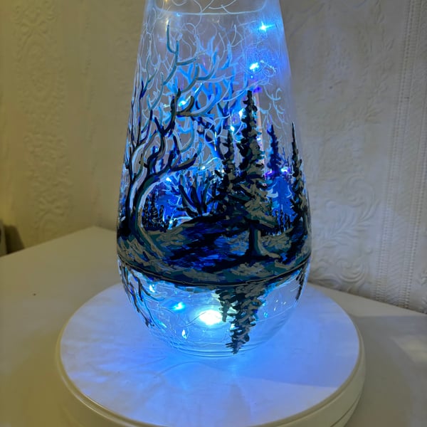 A hand painted and fired glass vase by Andrew Jenkins 