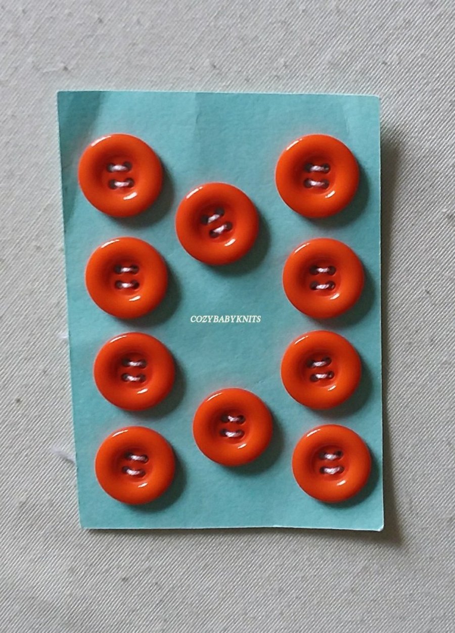 18mm Orange round buttons with four holes for attaching 