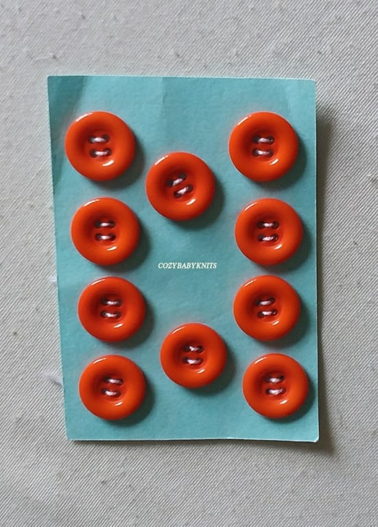 18mm Orange round buttons with four holes for attaching 