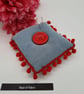 Pin cushion in denim with red bobble trim.  - Image 4