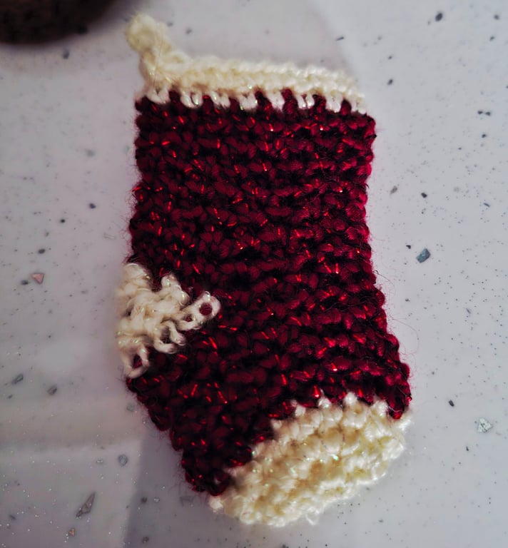Miniature crocheted festive stocking - red and cream