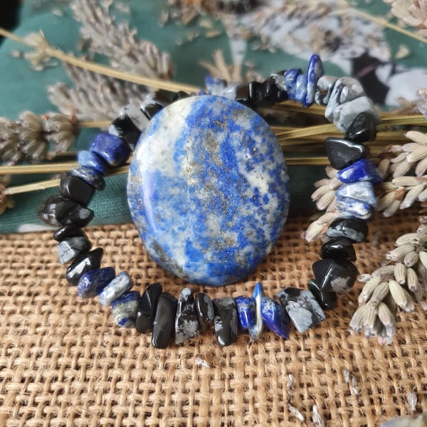 Lapis lazuli  and snowflake obsidian bracelet with lapis lazuli palm stone