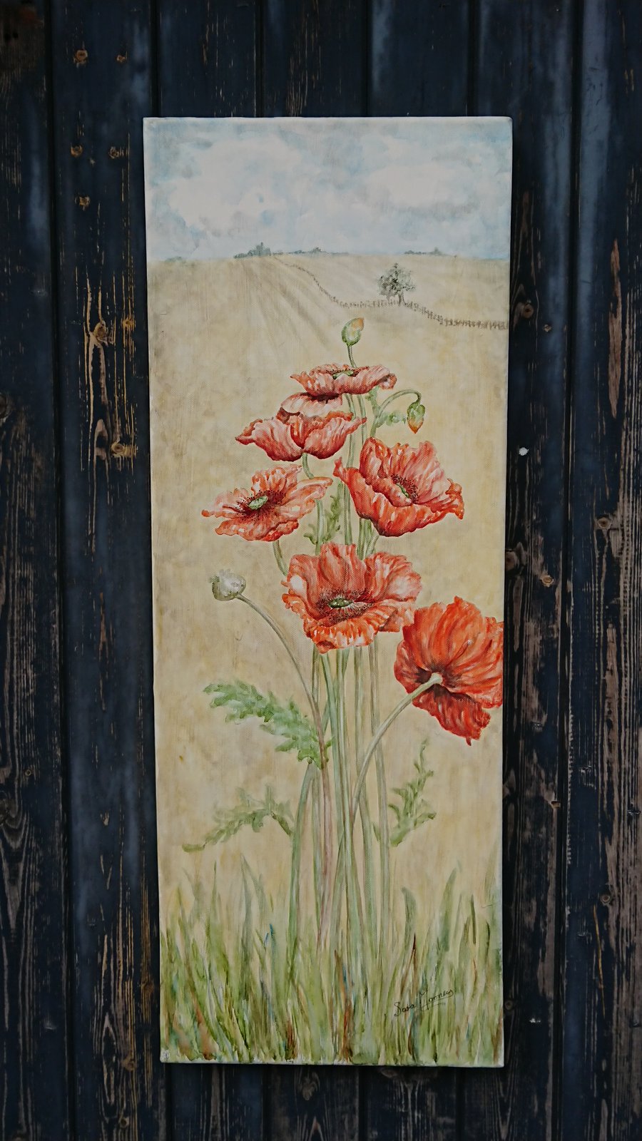Red poppy painting on vertical narrow canvas. Norfolk field and sky views.