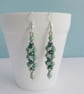 Long Green Glass Beaded Drop Earrings with Crystals - Image 1