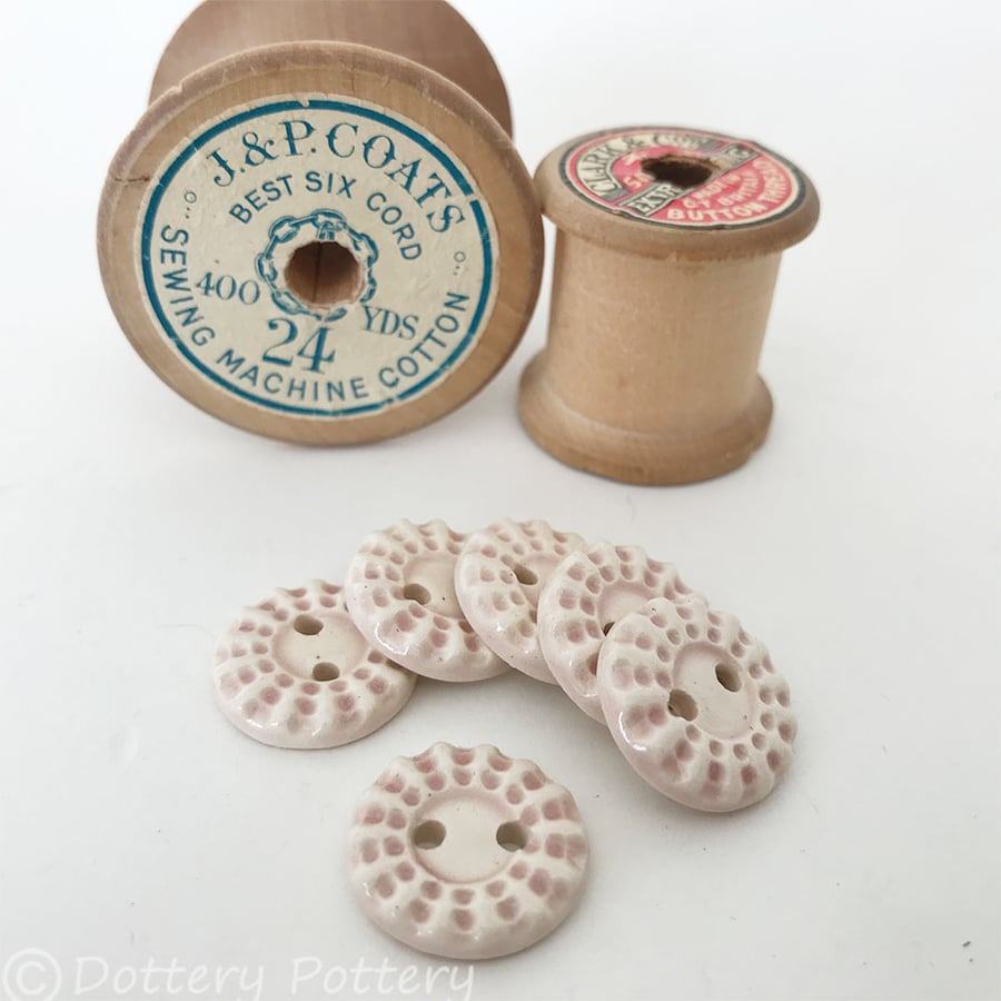Set of six little pale pink coloured round ceramic handmade buttons