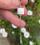 Silver long dangly pendulum earrings with butterflies  - Image 2