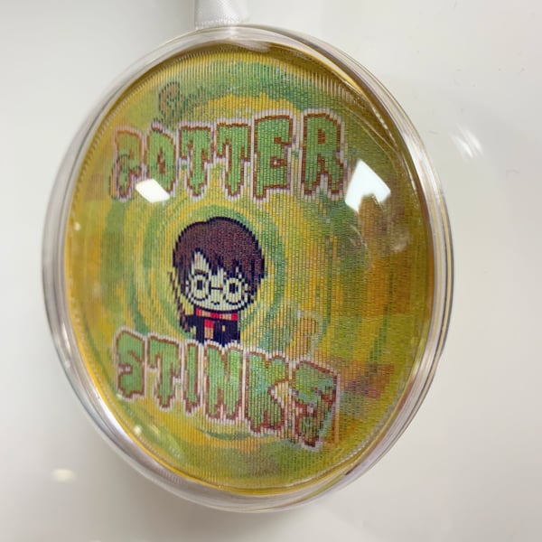 Potter Stinks lenticular "flip" bauble - changing image!