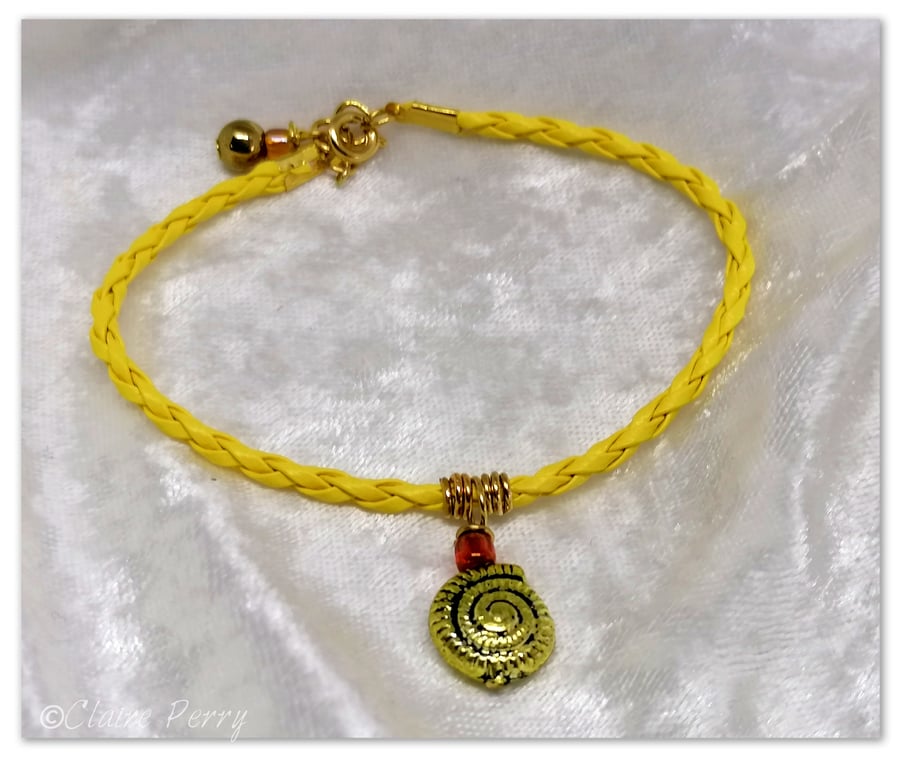 Bracelet Yellow Faux Leather with gold plated Seashell charm bead.