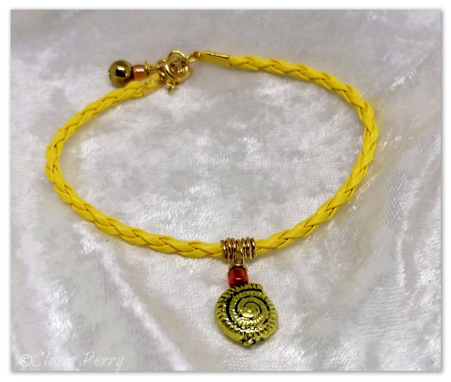 Bracelet Yellow Faux Leather with gold plated Seashell charm bead.