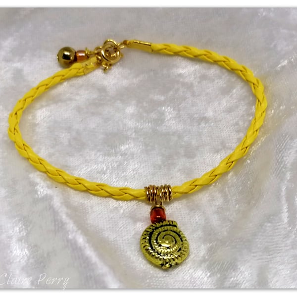 Bracelet Yellow Faux Leather with gold plated Seashell charm bead.