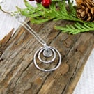Circles Necklace. Recycled Sterling Silver Pebble with Daffodil & Rings