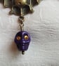 Spooky Antique Bronze Bat Earrings with Purple Skulls. - Image 3