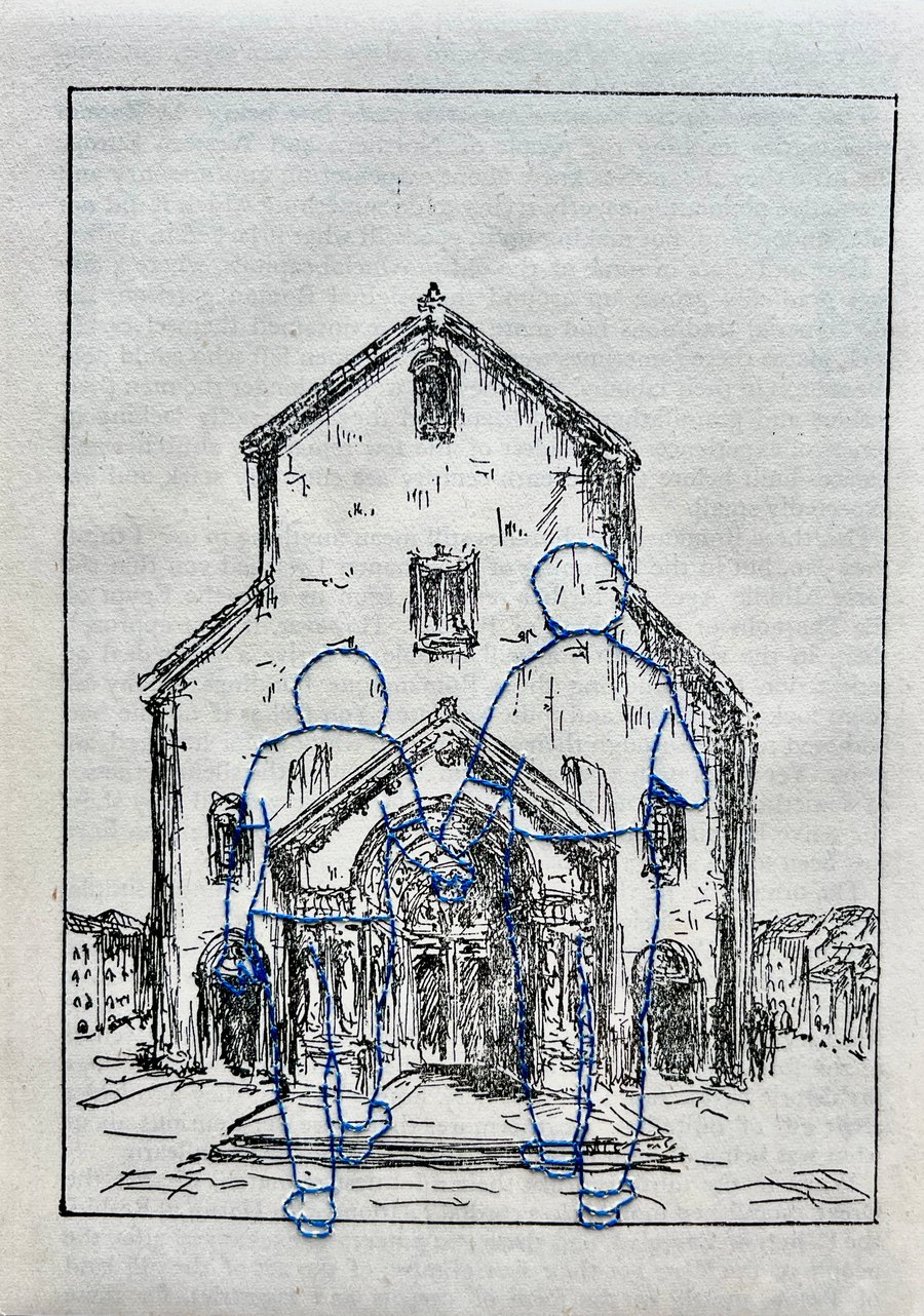 Hand embroidered vintage book page