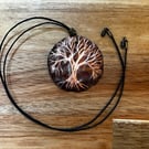Hand-engraved burnished copper necklace with tree motive