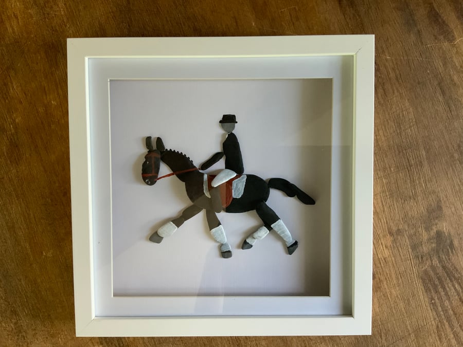 Horse. Dressage Horse and Rider pebble Art. 11” square deep white box frame. 