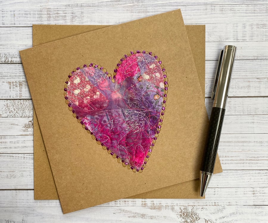 Up-cycled pink embroidered heart card. 