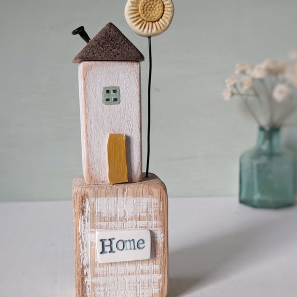 Little Wooden Hut with Clay Sunshine Flower 'Home'