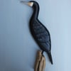 Wall mounted cormorant