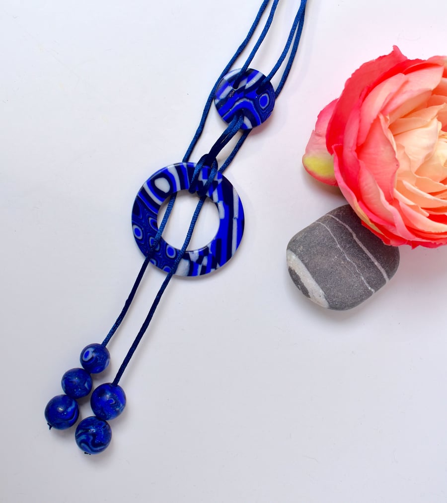 Blue and Glitter White Reversible Polymer Clay Lariat Necklace