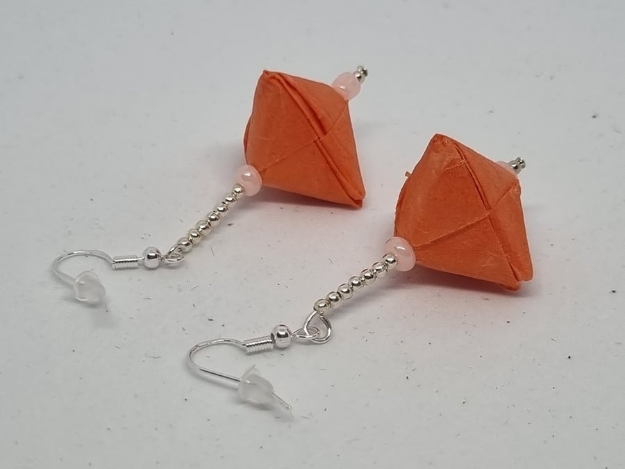 Origami earrings:  coral-coloured paper  and small beads 