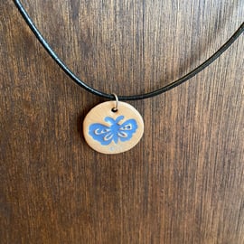Blue butterfly pendant