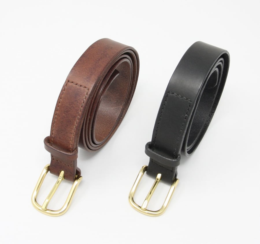 1" leather belt; brass buckle; choice of black or brown leather