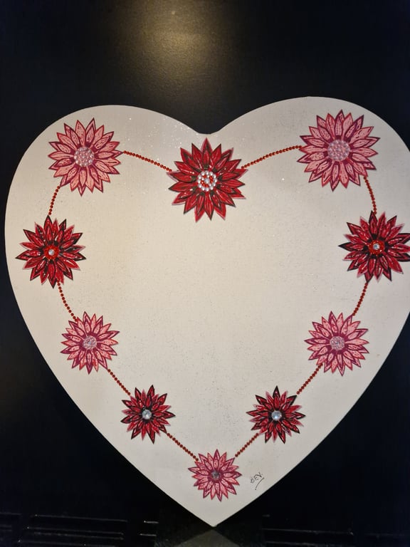 Heart shaped canvas photo frame.