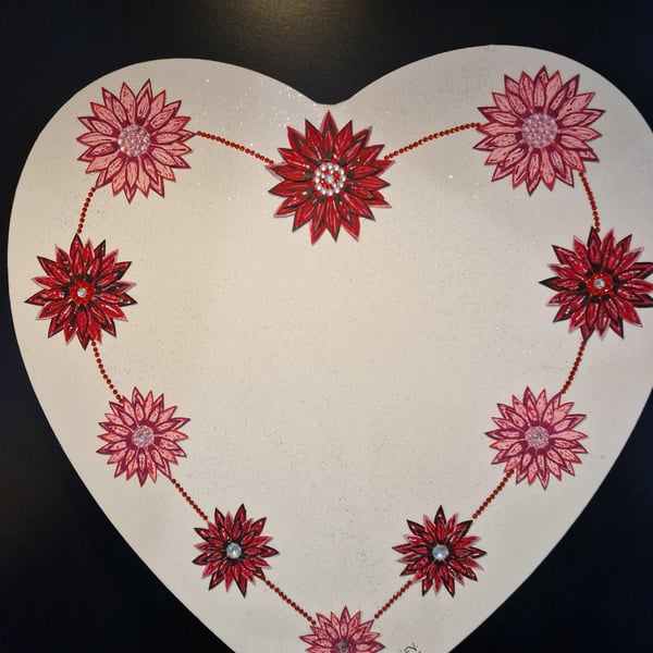 Heart shaped canvas photo frame.