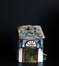 Wonky Driftwood Barn H: 9.2cm approx W: 8cm approx D: 7.3cm approx
