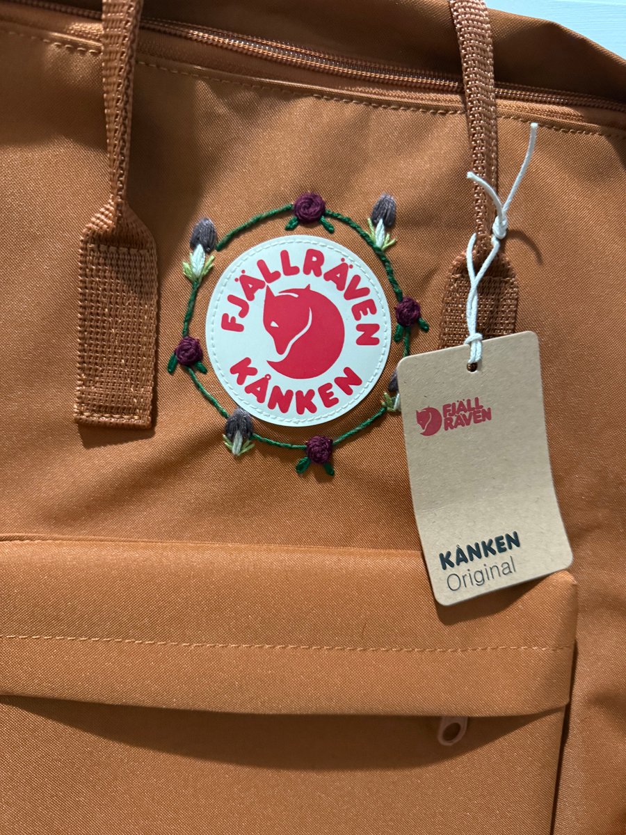 Fjallraven backpack in rust with hand embroidered mushrooms and roses 