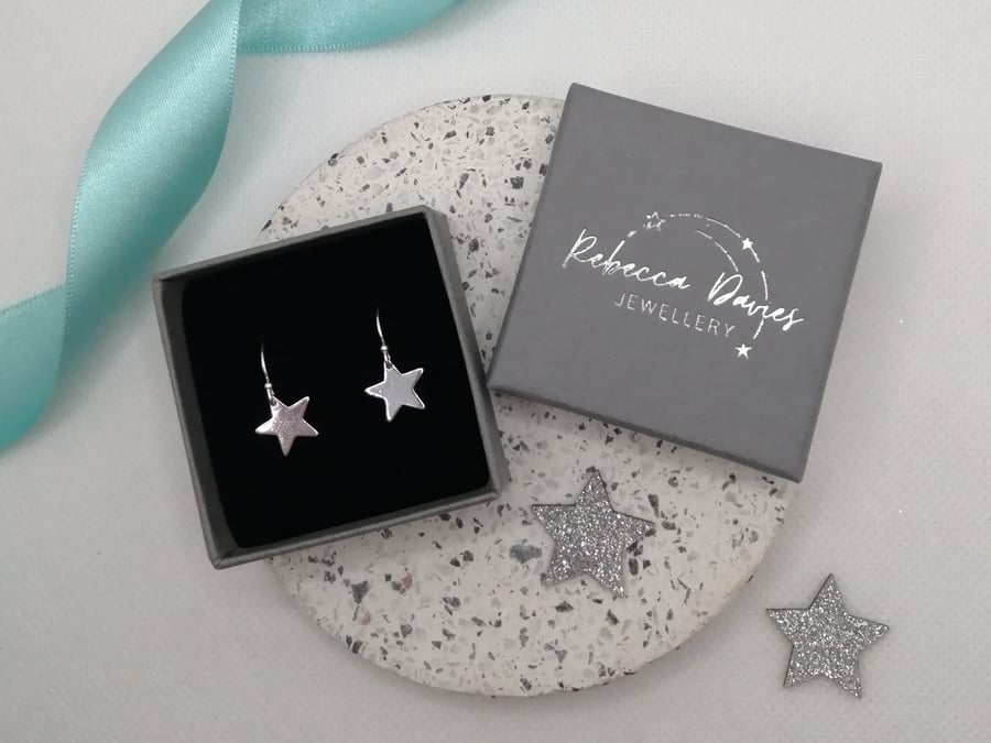 Silver Stars dangly earrings. Handmade Sterling Silver.