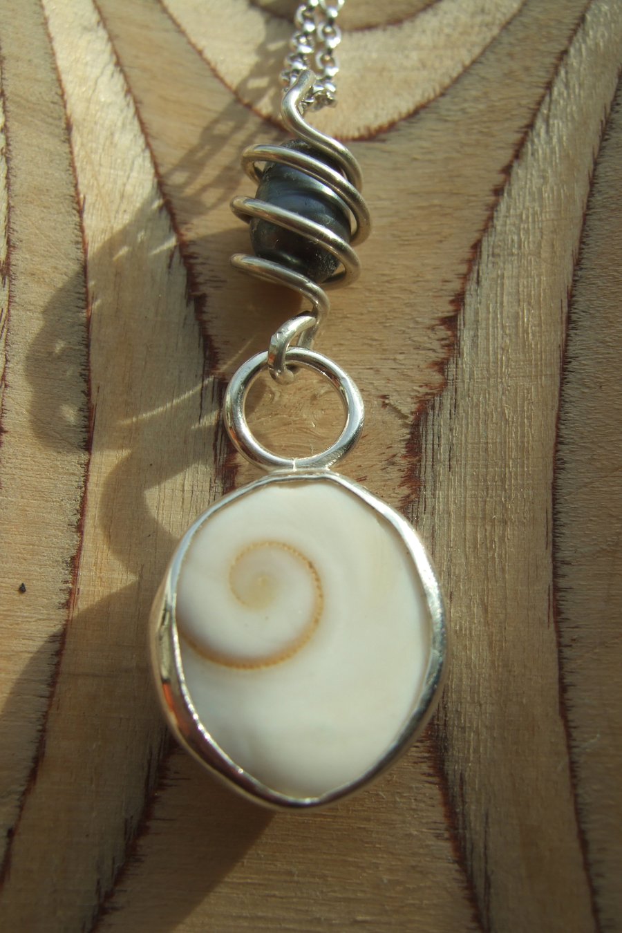 Shiva's Eye Shell and Black Pearl Pendant